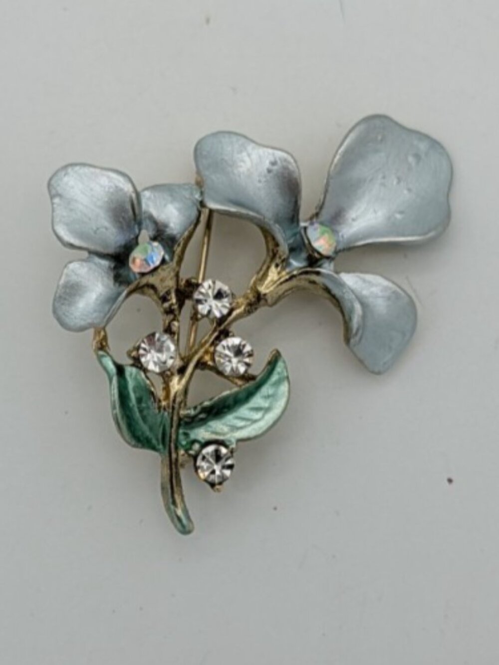 vintage blue enamel flower clear rhinestones green enamel leaves brooch pin